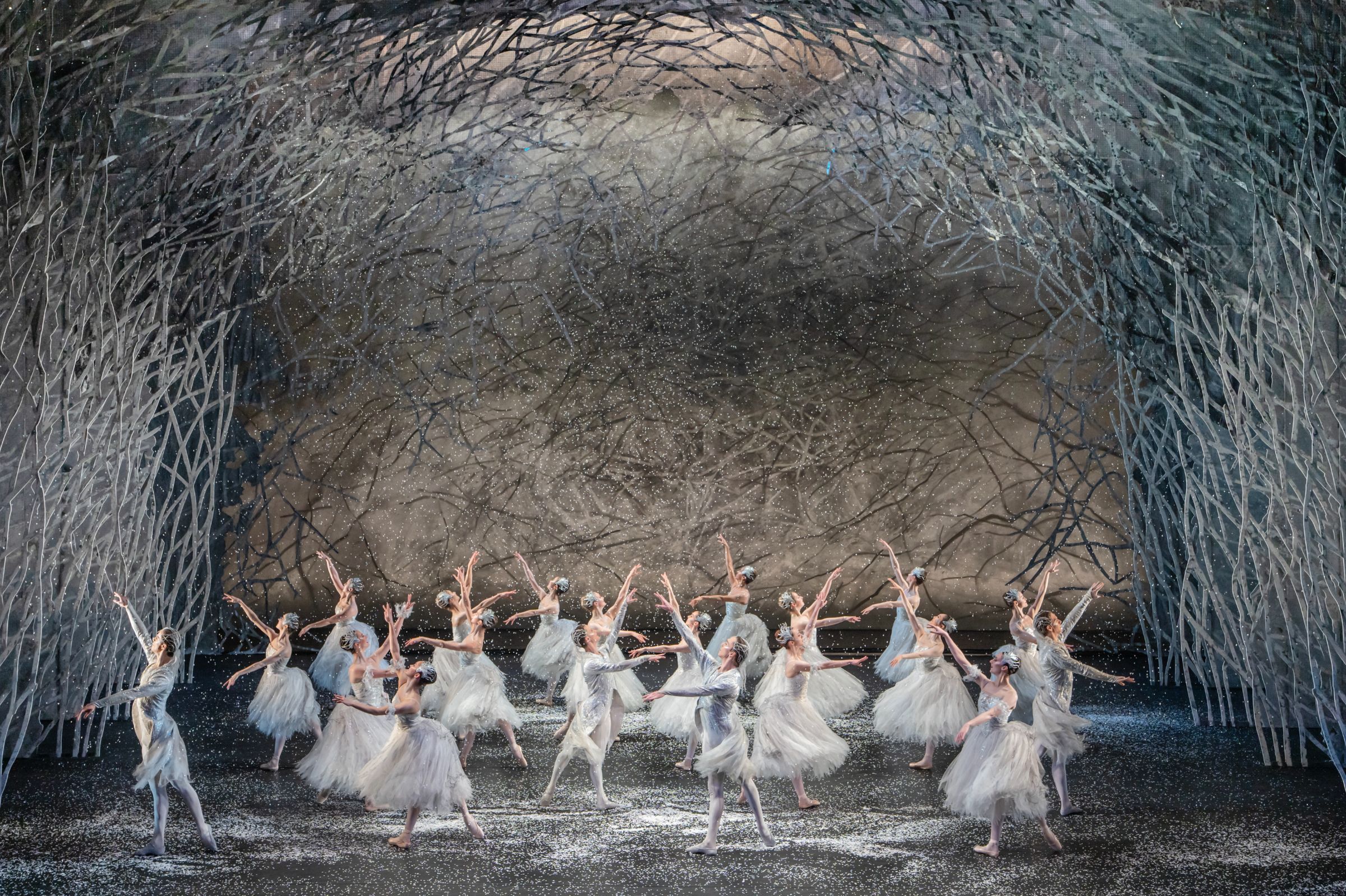Artists of Birmingham Royal Ballet in the Snow Scene in Sir Peter Wright's <i>The Nutcracker</i> © Johan Persson