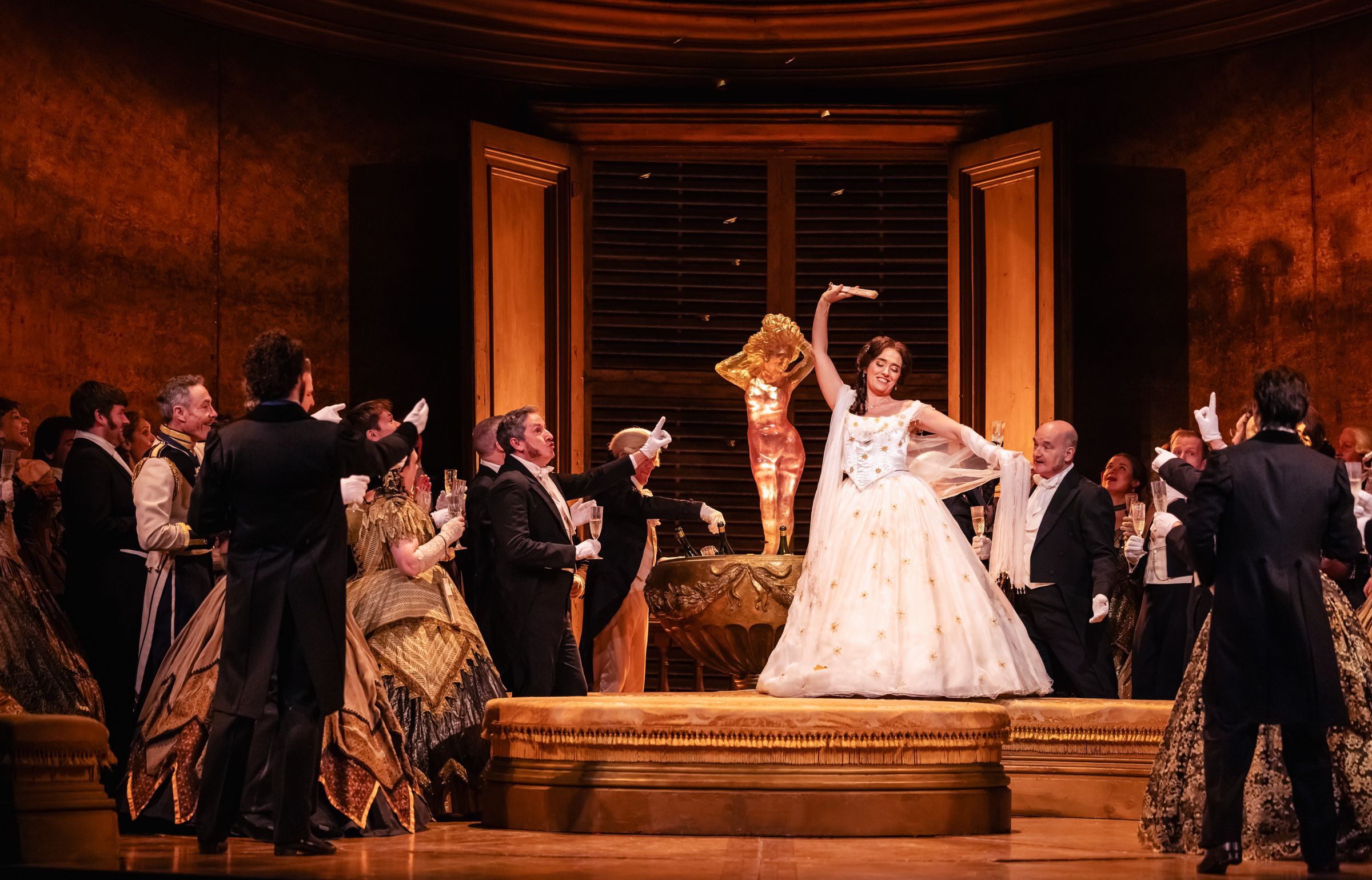 Ermonela Jaho (Violetta) and the Royal Opera Chrous &copy; The Royal Opera 2026 | Pamela Raith