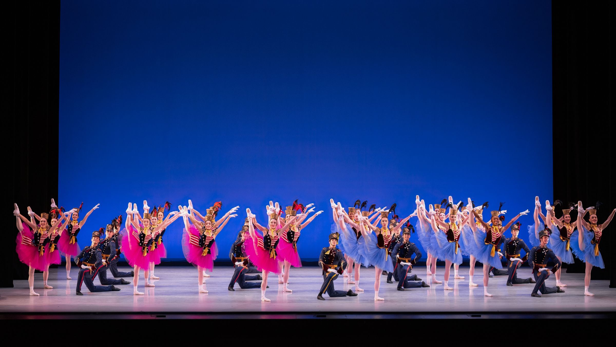 Kansas City Ballet in George Balanchine's <i>Stars and Stripes</i> © The George Balanchine Trust. Photography by Brett Pruitt & East Market Studios
