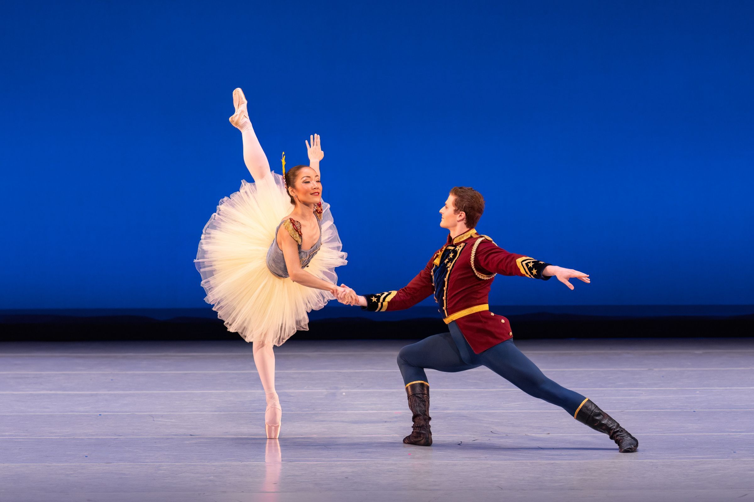 Naomi Tanioka and Paul Zusi in George Balanchine's <i>Stars and Stripes</i> © The George Balanchine Trust. Photography by Brett Pruitt & East Market Studios
