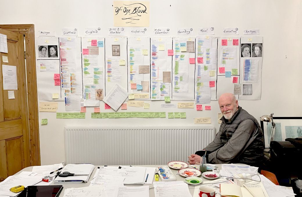 Brett Dean sits by the wall plan for <i>Of One Blood</i> &copy; Heather Betts