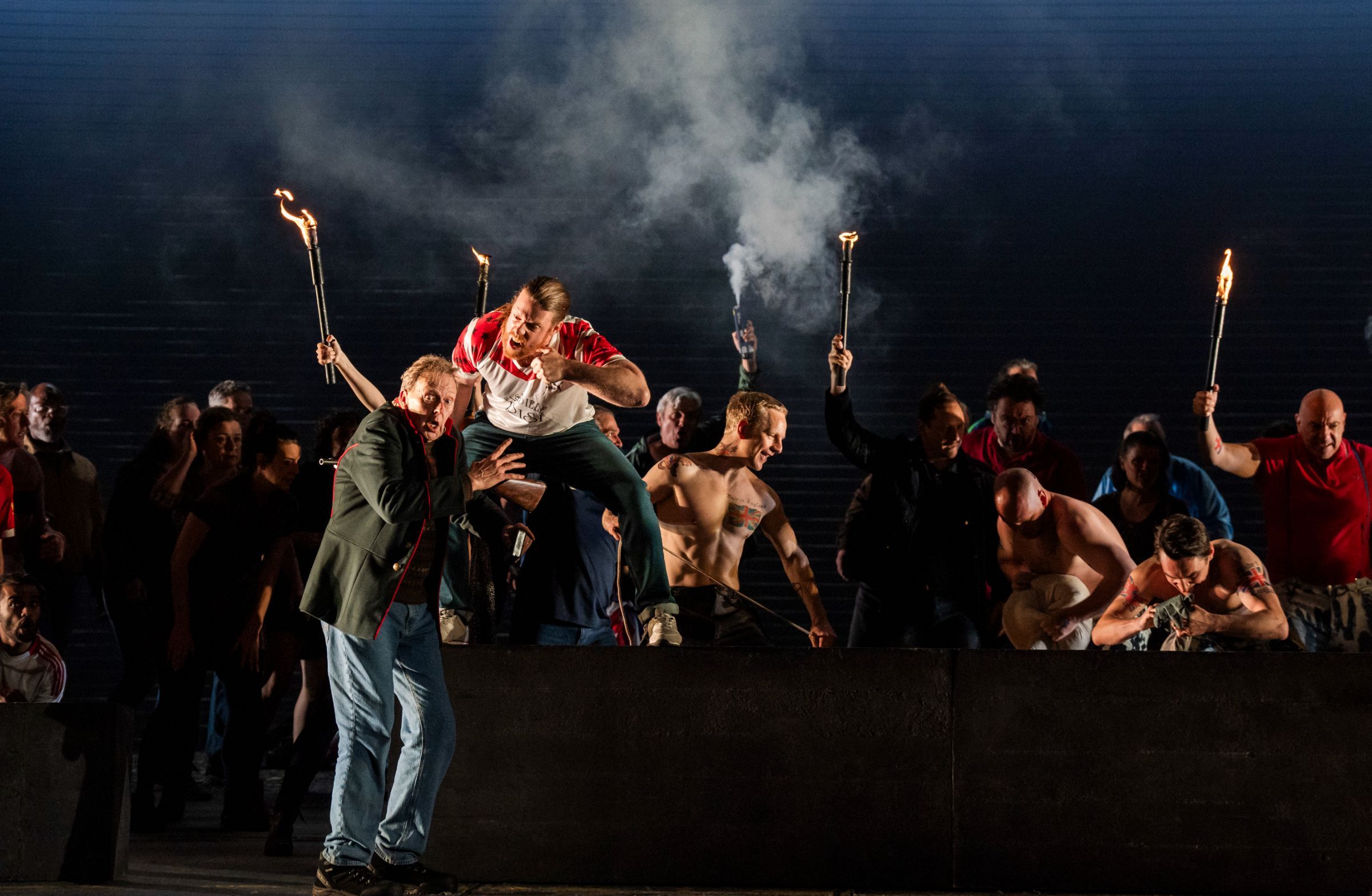 John Graham-Hall (Bob Boles), Barnaby Rea (Hobson) and chorus &copy; RBO | Tristram Kenton