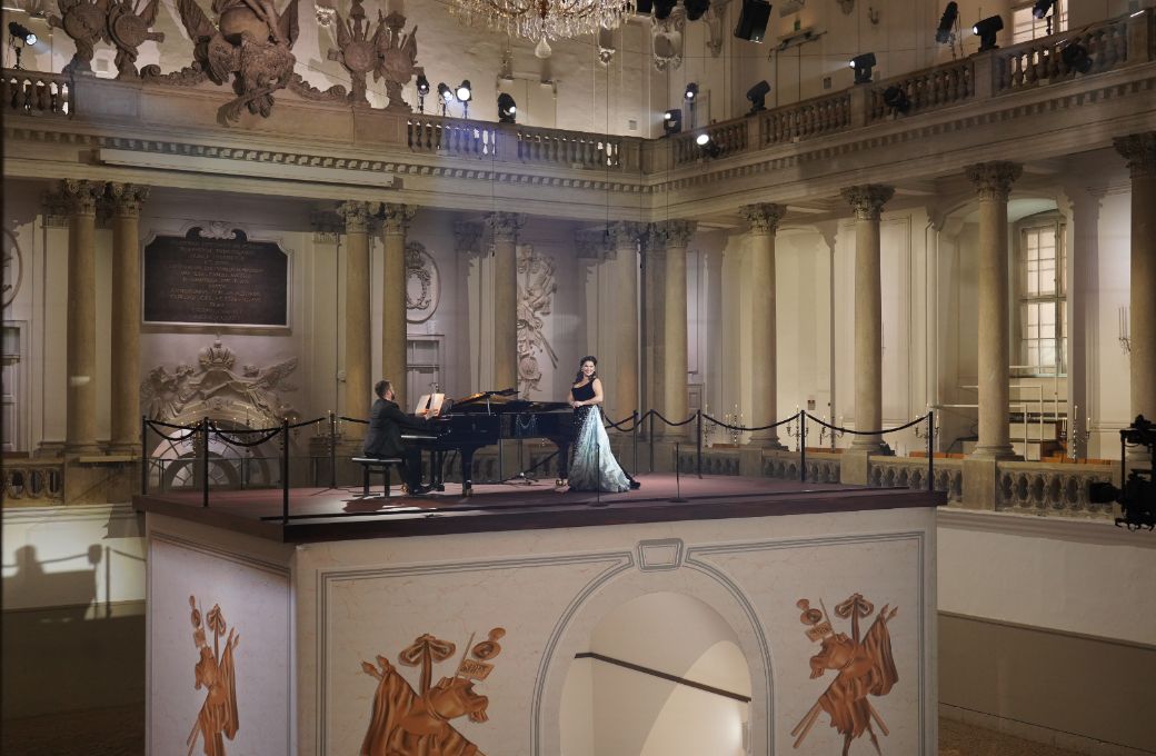 Pavel Nebolsin and Anna Netrebko in the Spanish Riding School, Vienna &copy; J&uuml;rgen Hausmann | Met Opera