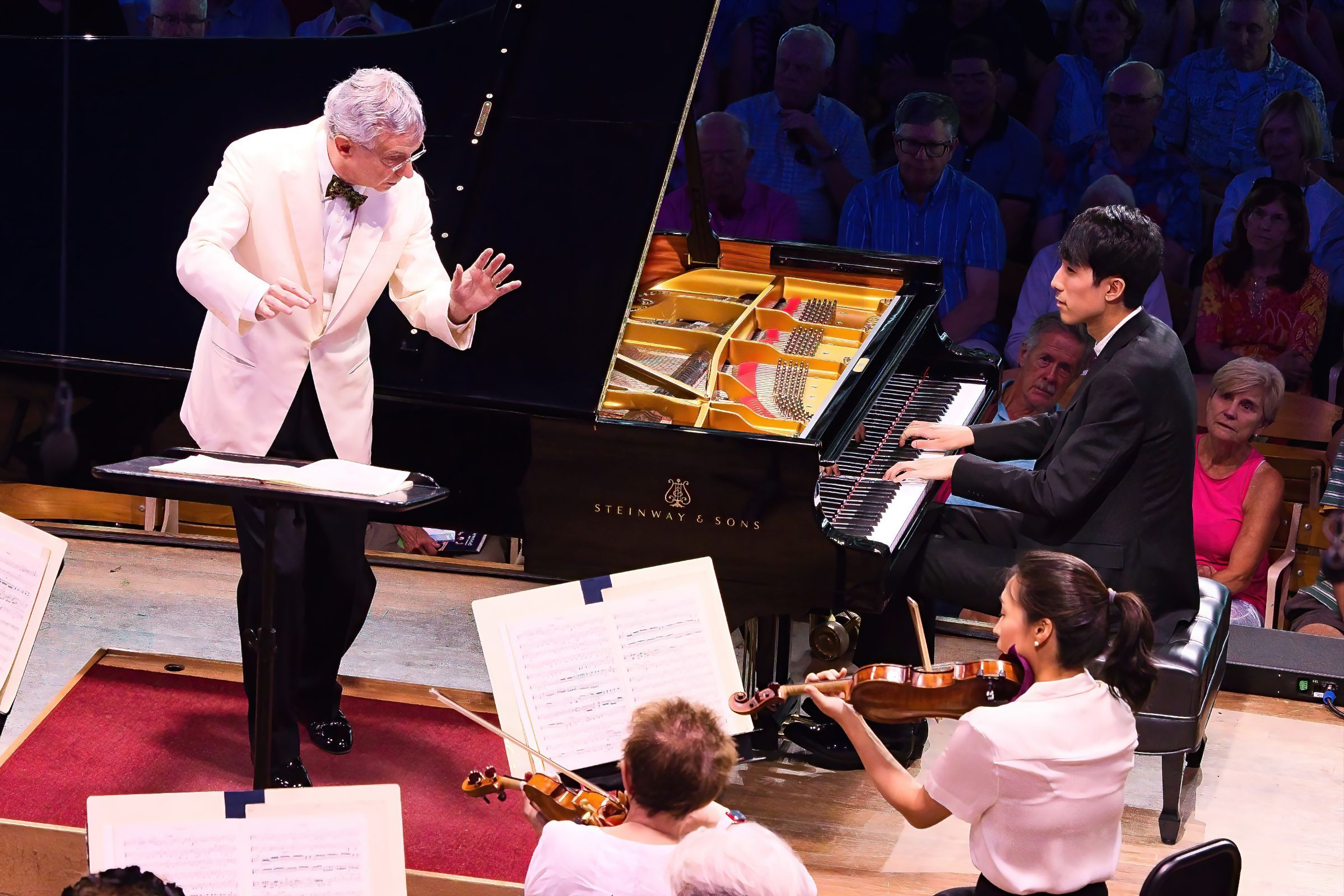 Fabio Luisi, Eric Lu and the Boston Symphony Orchesta &copy; Hilary Scott, courtesy of the BSO