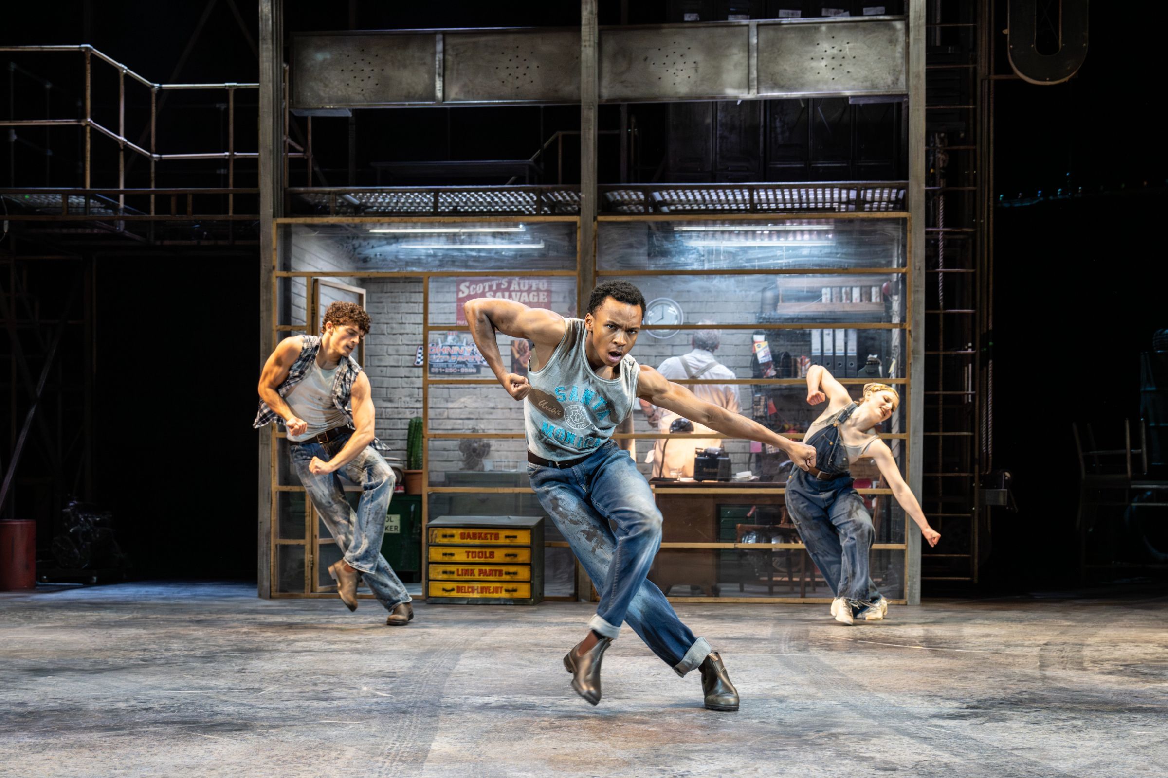 Rory MacLeod, Xavier Andriam Bolanoro and Lyra Treglown in Matthew Bourne’s <i>The Car Man</i> © Johan Persson
