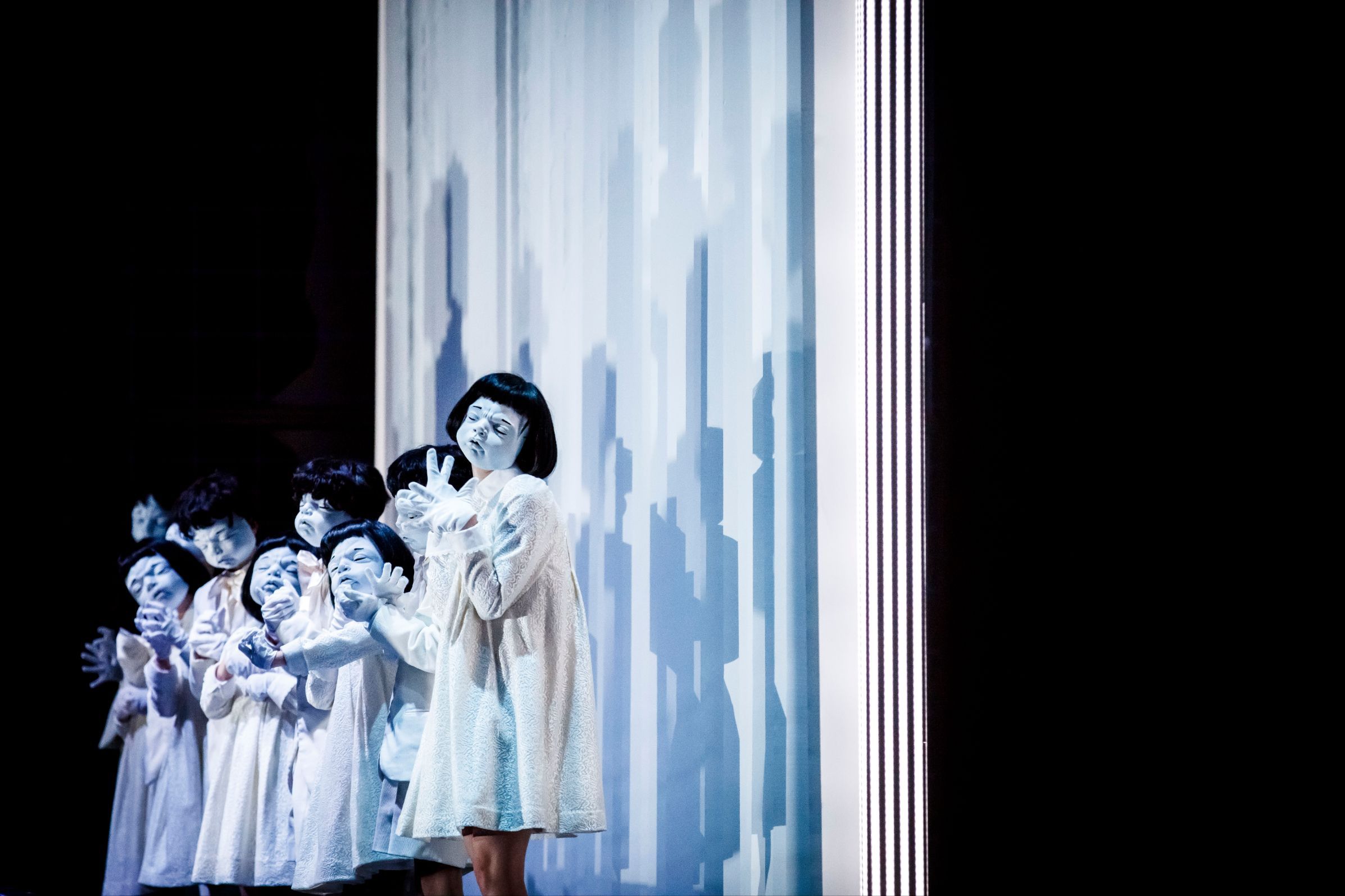 Masked children in Polish National Opera’s <i>Die Frau ohne Schatten</i> &copy; Krzysztof Bieliński