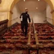 A Kimmel Center employee cleans a banister in the Merriam Theater lobby &copy; Kimmel Center
