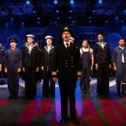 Peter Kirk (Ralph Rackstraw) and the Opera Holland Park Chorus &copy; Ali Wright