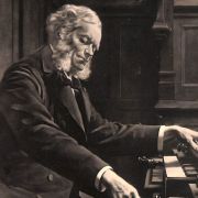 César Franck at the console of the Basilique Sainte-Clotilde organ, 1888 &copy; Public domain
