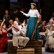 Peter Kálmán (Dulcamara), Lubov Karetnikova (Adina) and chorus &copy; Agnese Zeltiņa | Latvian National Opera