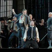 Michael Fabiano (Manrico), Igor Golovatenko (Conte di Luna) and chorus &copy; Ken Howard | Met Opera